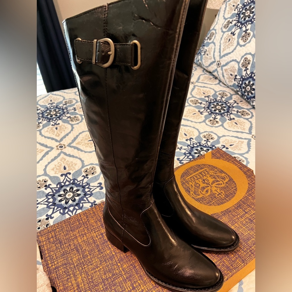 Size 6 Born “Cort” black boots. New in box. Measures 16” high.